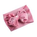 Dusty pink velvet baby headband featuring a large bow and a soft wide elastic band - Pink