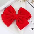 Handmade large red bow hair clip with textured bubble fabric for kids and babies - Red