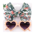 Close-up of heart-shaped sunglasses and tropical floral bow headband set for girls - Tropical Green Leaf (DP029-5)