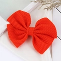 Bright orange bubble fabric hair bow clip for kids with soft textured handmade finish - Orange