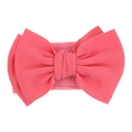 Soft waffle knit baby headband with a large bow design in vibrant watermelon pink - Deep Watermelon Red