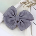 Dusty purple textured fabric bow hair clip for girls on elegant white silk background - Gray