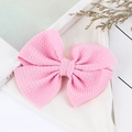 Pink large waffle fabric hair bow clip for babies and kids with soft textured fabric - Light Pink
