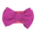 Elastic waffle fabric baby headband featuring a large fuchsia pink bow for toddlers - Purplish Red