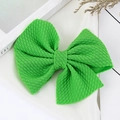 Bright green seersucker handmade hair bow clip with textured fabric for kids - Grass Green