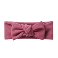 Detailed view of dark pink bow headband with soft knitted texture for infants - Purplish Red