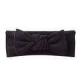 Macro detail of the soft black cashmere-like fabric texture and large bow on baby headband - Black