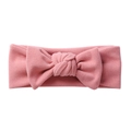 Pink elastic infant headband with a stylish knotted bow made of soft cashmere-like fabric - Blush
