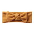 Soft mustard yellow cashmere-like baby headband with a large decorative bow tie - Turmeric