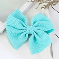 Lake blue oversized bow hair clip for girls with a textured waffle fabric design - Aqua Blue