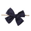 Bandeau bébé en nylon nude avec grand nœud bleu marine brodé de fleurs ajourées - Bleu Marine