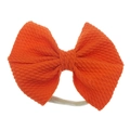 Baby Haarband mit einer leuchtend orangefarbenen Schleife aus Strukturstoff - Fertigprodukt / Orange