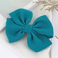 Teal blue handmade bow hair clip for children featuring elegant pleated fabric texture - Peacock Blue