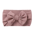 Dusty pink baby headband with a large 3D ribbed knit bow on a soft elastic band - Coffee