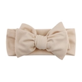 Detailed texture of ribbed knit cotton baby headband with large bow in beige color - Beige