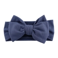 Detailed view of dark blue ribbed knit fabric texture on baby bow headband - Navy Blue