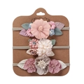 Detail of three floral baby headbands with pink fabric flowers and pearl accents - Nude Pink and Gray Purple Series (DP064-2)