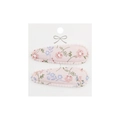 Close-up of floral fabric hair clips with wave edges on a display card for kids - Pink Floral