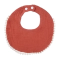 Caramel orange cotton gauze baby bib with white pom-pom trim and snap buttons - Rust red