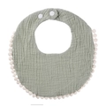 Sage green cotton gauze baby bib with white pom-pom lace edge and adjustable snaps - Bean Green