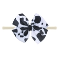 Soft nylon baby headband featuring a large cow print knit bow in black and white - Cow Print Style (EE55-106#)