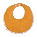 Ginger cotton gauze baby bib with white pom-pom trim and adjustable snap fasteners - Ginger Yellow