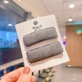 Close-up of grey cashmere-like rectangular BB hair clips with wavy edges on a card - Gray (PP180-10)