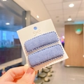 Detail view of two rectangular grey-blue fabric hair clips on a white display card - Gray Blue (PP180-26)