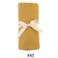 Mustard yellow bamboo cotton swaddle wrap for newborns, tied with cream ribbon - Turmeric / 100*100cm