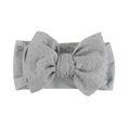 Vue détaillée d'un bandeau gris pour bébé en tissu jacquard doux avec un grand nœud élégant - Gris clair