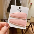 Close-up of pink fabric-covered BB hair clips with scalloped edges on a display card - Pink Fabric Scalloped Edge (PP174-50)