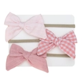 Detailed close-up of a 3-piece baby headband set with fabric bows on nylon bands - Pink Vintage Red White Plaid Style (DP123-8)