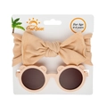 Detail of baby bear ears sunglasses and matching bow headband on a white display card - Apricot