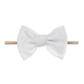 Baby nylon headband featuring a white dotted tulle bow on a soft nude elastic band - White