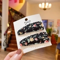 Paire de barrettes à cheveux en tissu noir à fleurs rouges et jaunes pour petites filles - Style Floral Multicolore Noir (PP174-2)