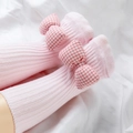 Chaussettes bébé roses en coton avec nœud à carreaux et maille côtelée douce - Rose Moyen