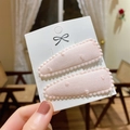 Pair of soft pink fabric hair clips with lace edges and fuzzy polka dots for toddlers - Pp174-60