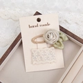 Handmade champagne fabric rose and cream lace flower hair clips on a display card - Champagne Gold (PP266-13)
