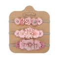 Three-piece set of pink floral baby headbands with elastic bands on a kraft display card - Pink Series Floral Combo Style (DP269-1) / Three-Piece Set
