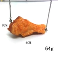 Realistic fried chicken leg pendant necklace with detailed texture and 8x4cm size - Orleans Chicken Drumstick
