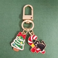Detail of Christmas cat candy cane and tree pendants on gold alloy keychain - Bow Christmas Tree and Candy Cane Cat