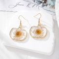 Detail of pumpkin shaped gold frame earrings with white daisy dried flowers and gold foil - White Daisy Small Pumpkin