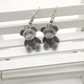 Cute dark grey flocked teddy bear earrings with silver hooks on a white wooden display - Dark Gray Bow Bear