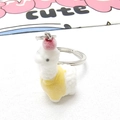 Close-up of cute flocked alpaca keychain with soft texture and metal keyring detail - Yellow Clothes Alpaca