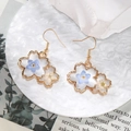 White cherry blossom drop earrings with dried flowers in gold alloy on a water ripple plate - White & Blue Floral