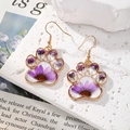 Detail of cat paw shaped earrings with purple dried flowers in transparent resin - Purple Cat Claw (Stainless Steel Earring Post)