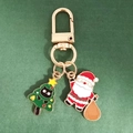 Porte-clés de Noël avec le Père Noël et un chat noir dans un sapin de Noël décoré - Chat Noir Sapin de Noël et Père Noël