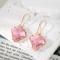 Elegant geometric pentagon pink crystal drop earrings with gold-finished metal hooks - Rose Pink
