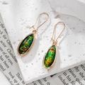 Orecchini geometrici a goccia stile boho con cristallo verde e placcatura in oro 18k - Ovale Verde