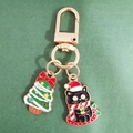 Cartoon black cat and green Christmas tree enamel keychain with golden alloy ring - Bow Christmas Tree and Candle Black Cat